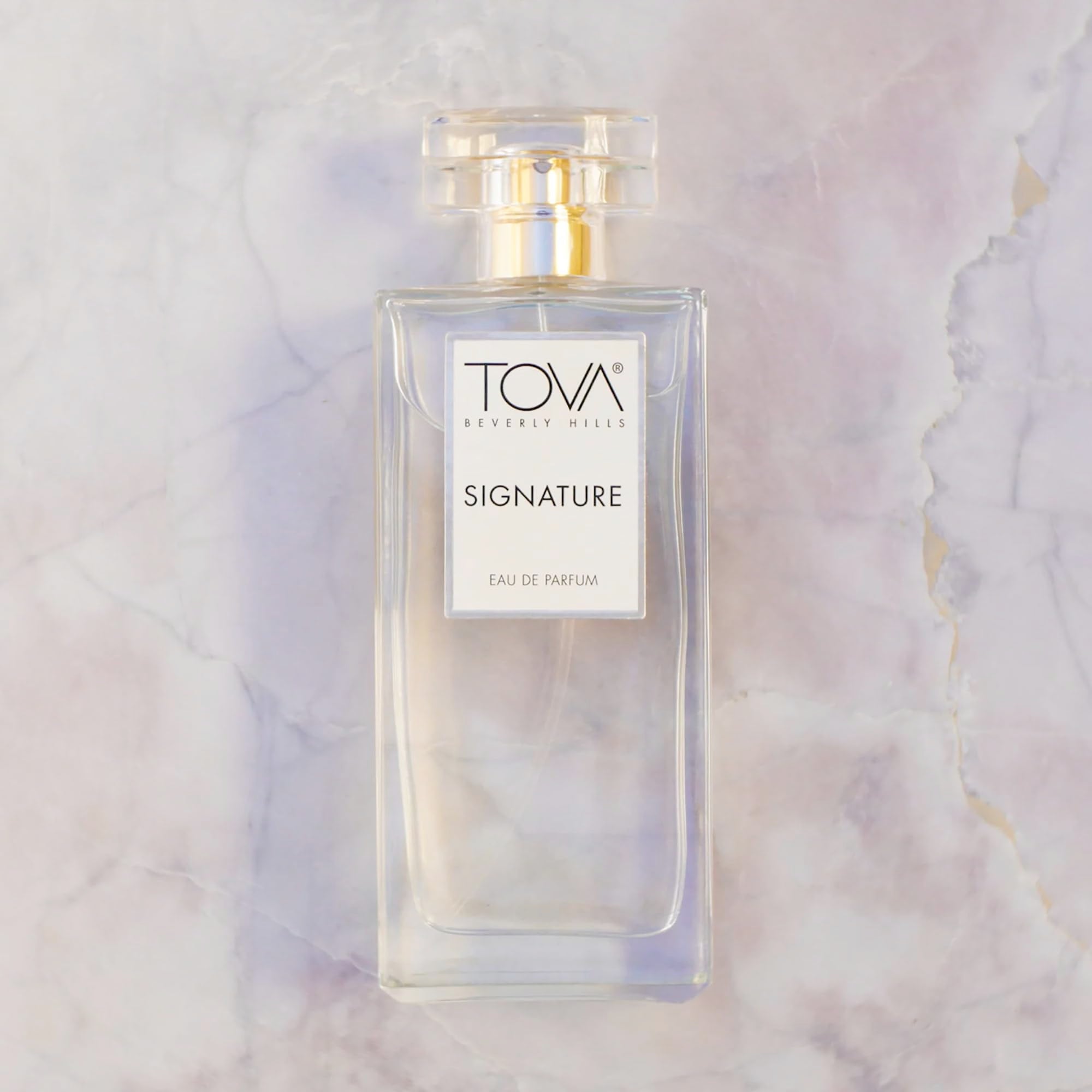 Tova Signature spray application shot demonstrates easy daily use for busy mornings and confidence