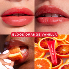 Tower 28 LipSoftie lip balm swatch on lips reveals a sheer red-orange tint.