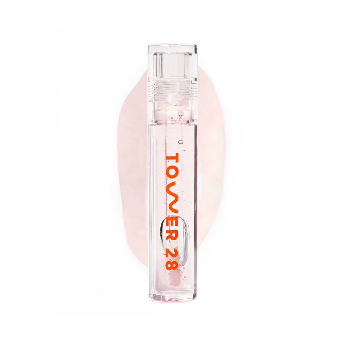 Tower 28 ShineOn Lip Jelly CHILL gloss on display showing clear shine and smooth feel