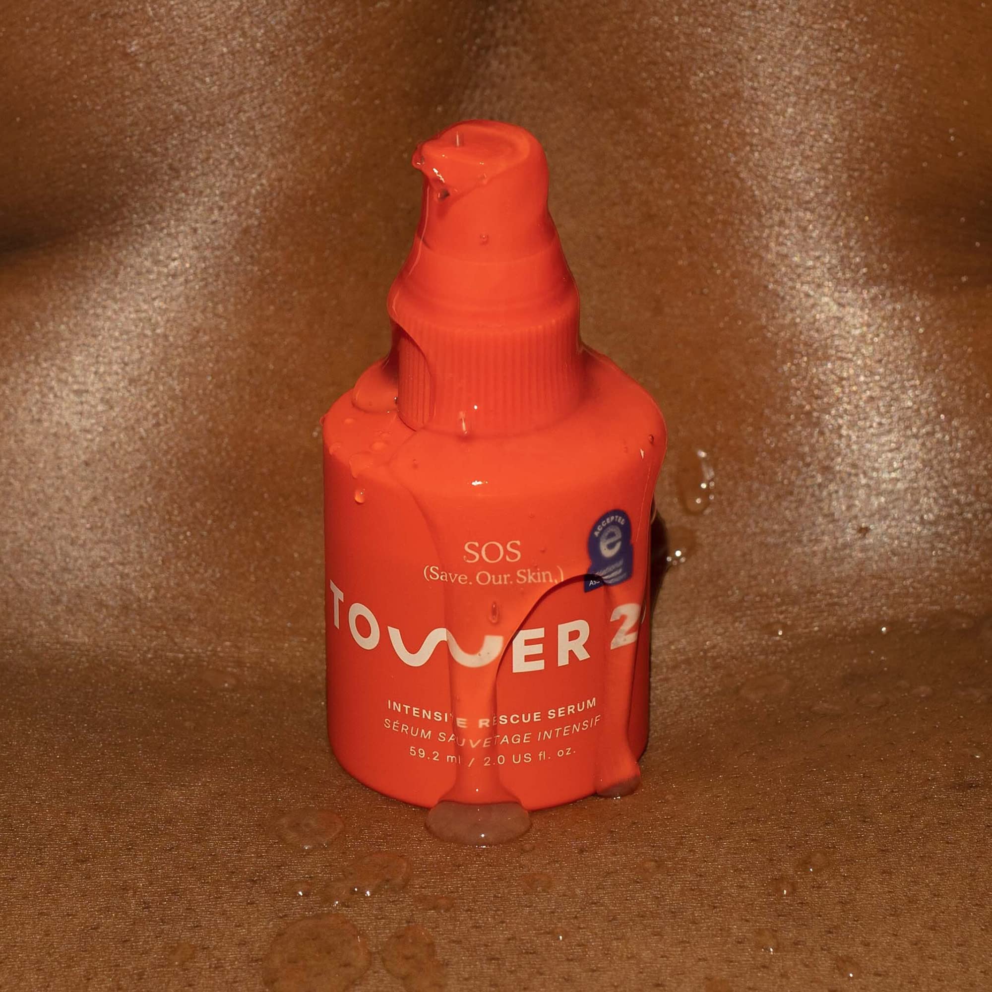 Tower 28 SOS Serum pump close-up showing easy application