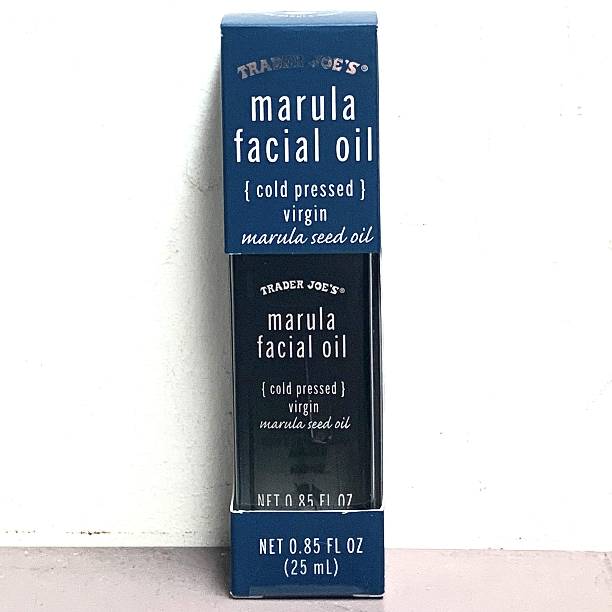 Trader Joe's Hydrating Marula Facial Oil bottle demonstrates lightweight hydration for soft skin.
