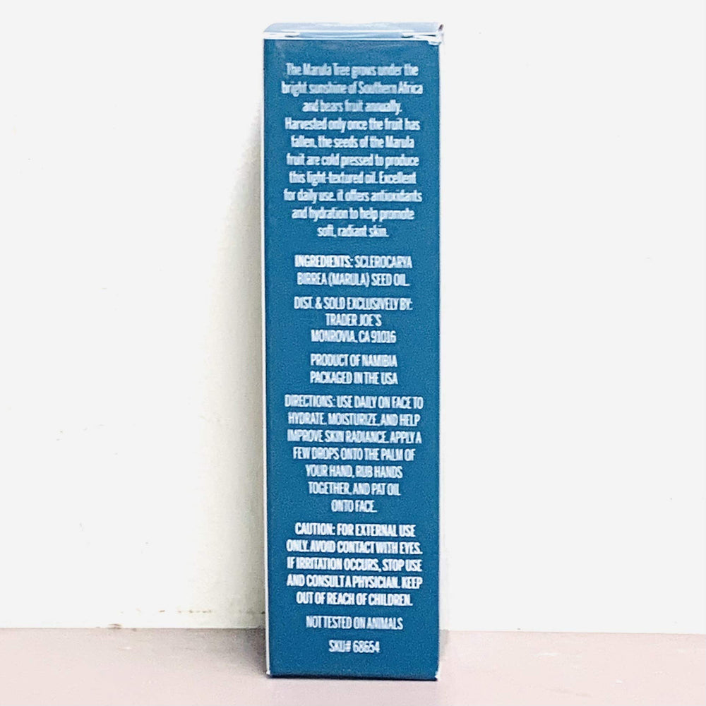 Trader Joe's Hydrating Marula Oil dropper image highlights a non-greasy formula for radiant skin.