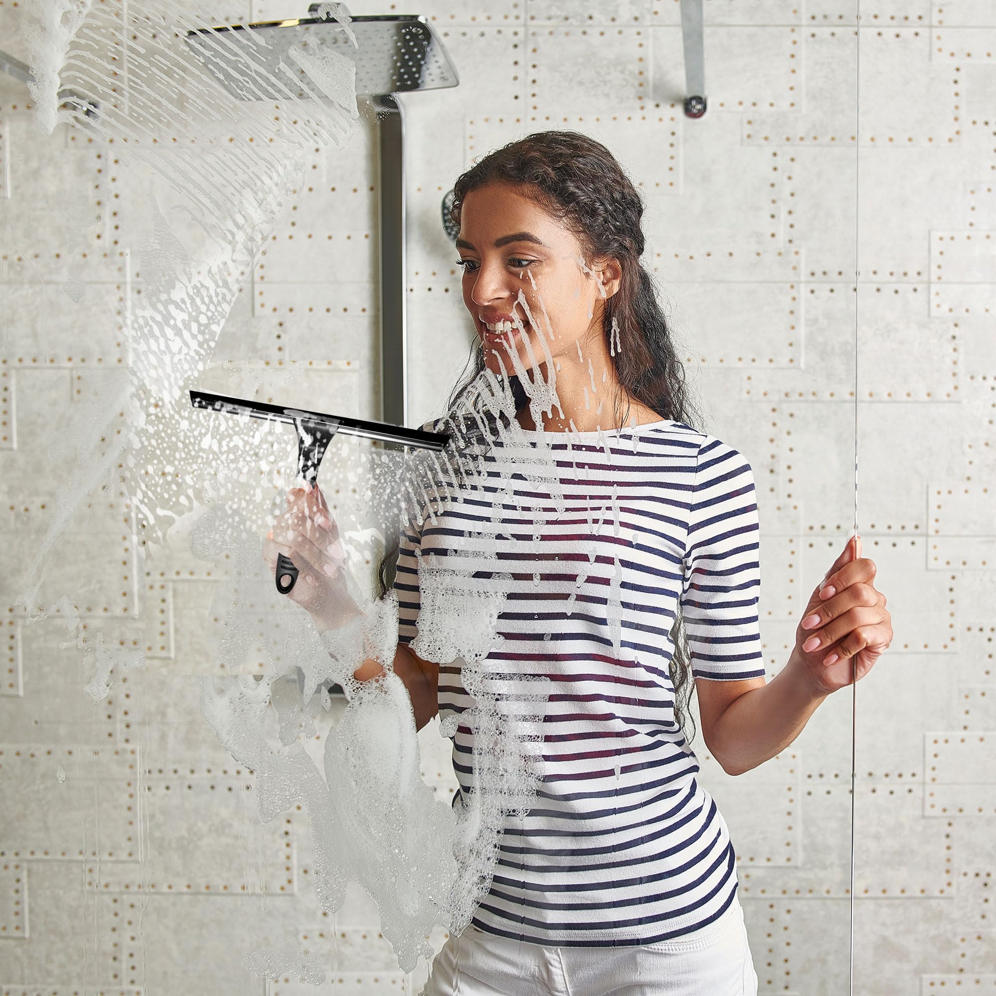 Trazon shower-squeegee demonstrating streak-free glass cleaning for shower doors.