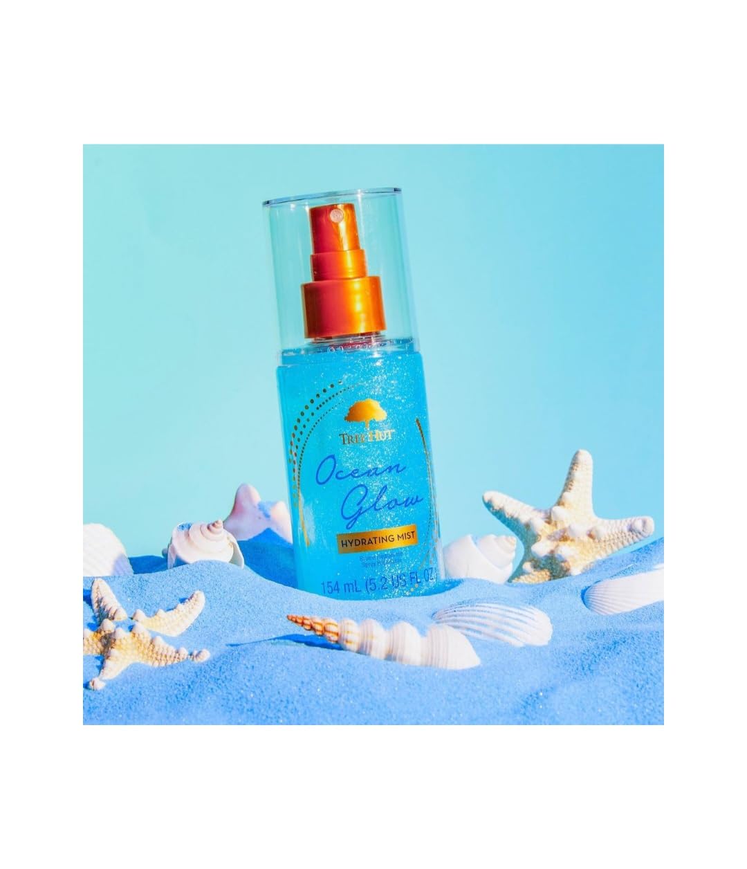 Tree Hut Ocean Glow body wash lathering on skin shows gentle cleansing and moisture.