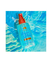 Tree Hut Ocean Glow fragrance mist bottle provides long-lasting aroma for everyday refreshment.