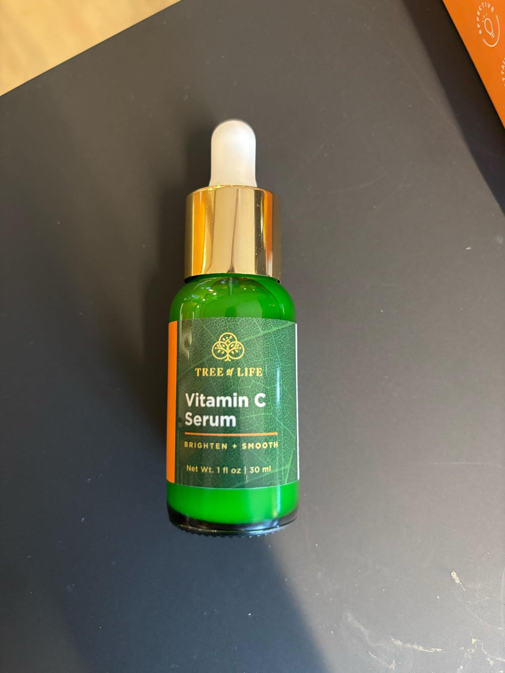 Tree of Life Beauty vitamin C serum dropper pouring for antioxidant protection