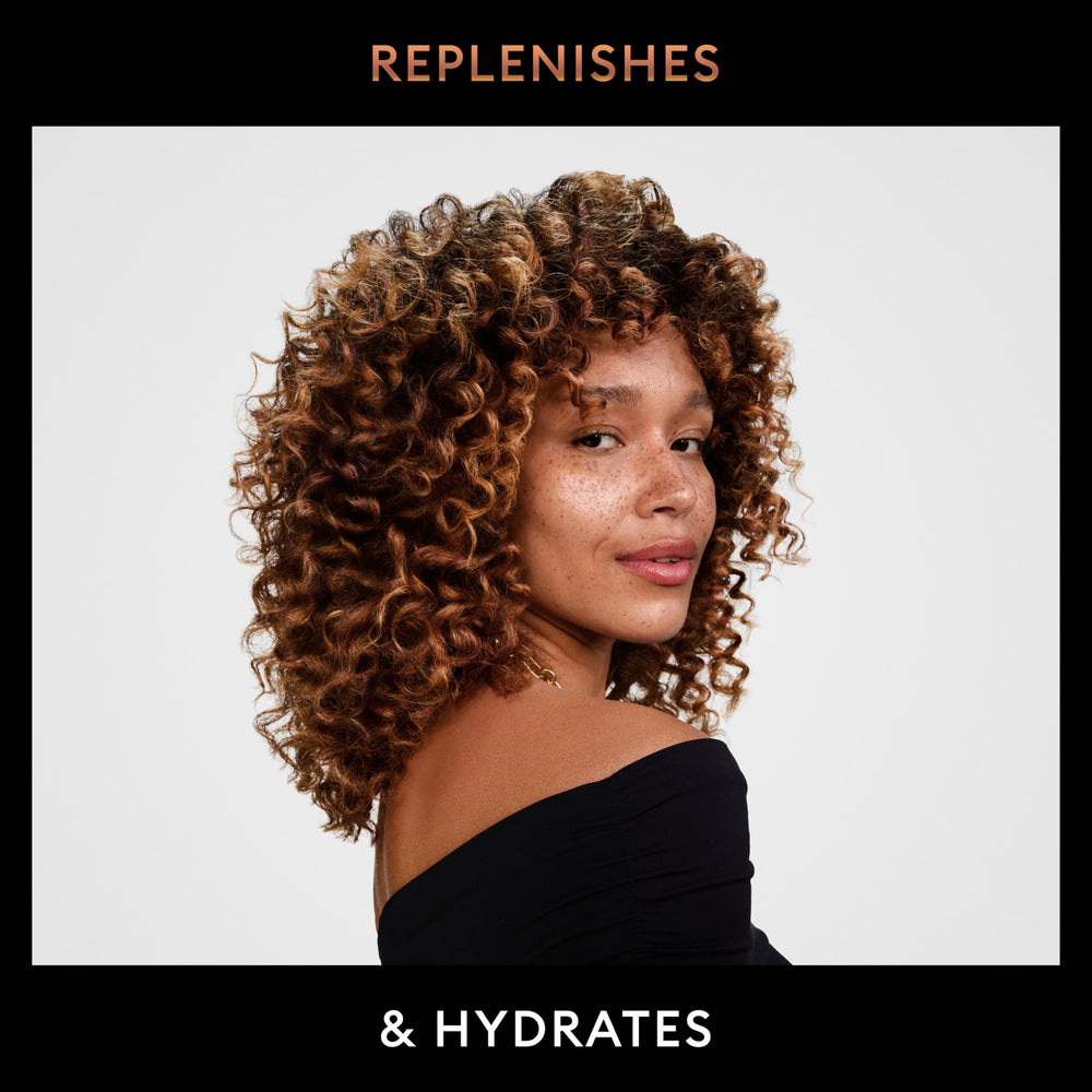TRESemmé Botanique Extra Hold Hairspray bottle for all-day hold.