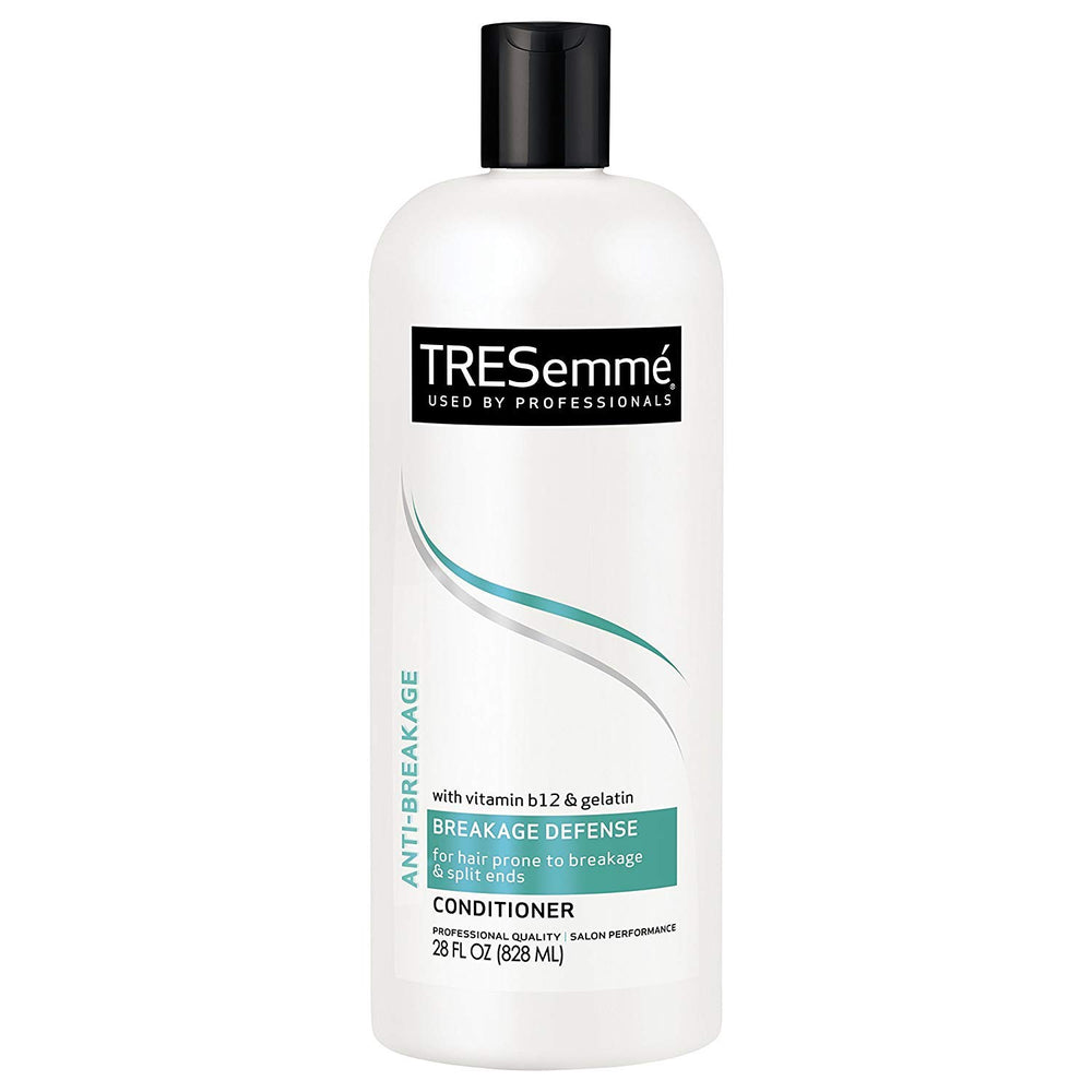 TRESemmé conditioner bottle pour showing Vitamin B12 for stronger hair instantly