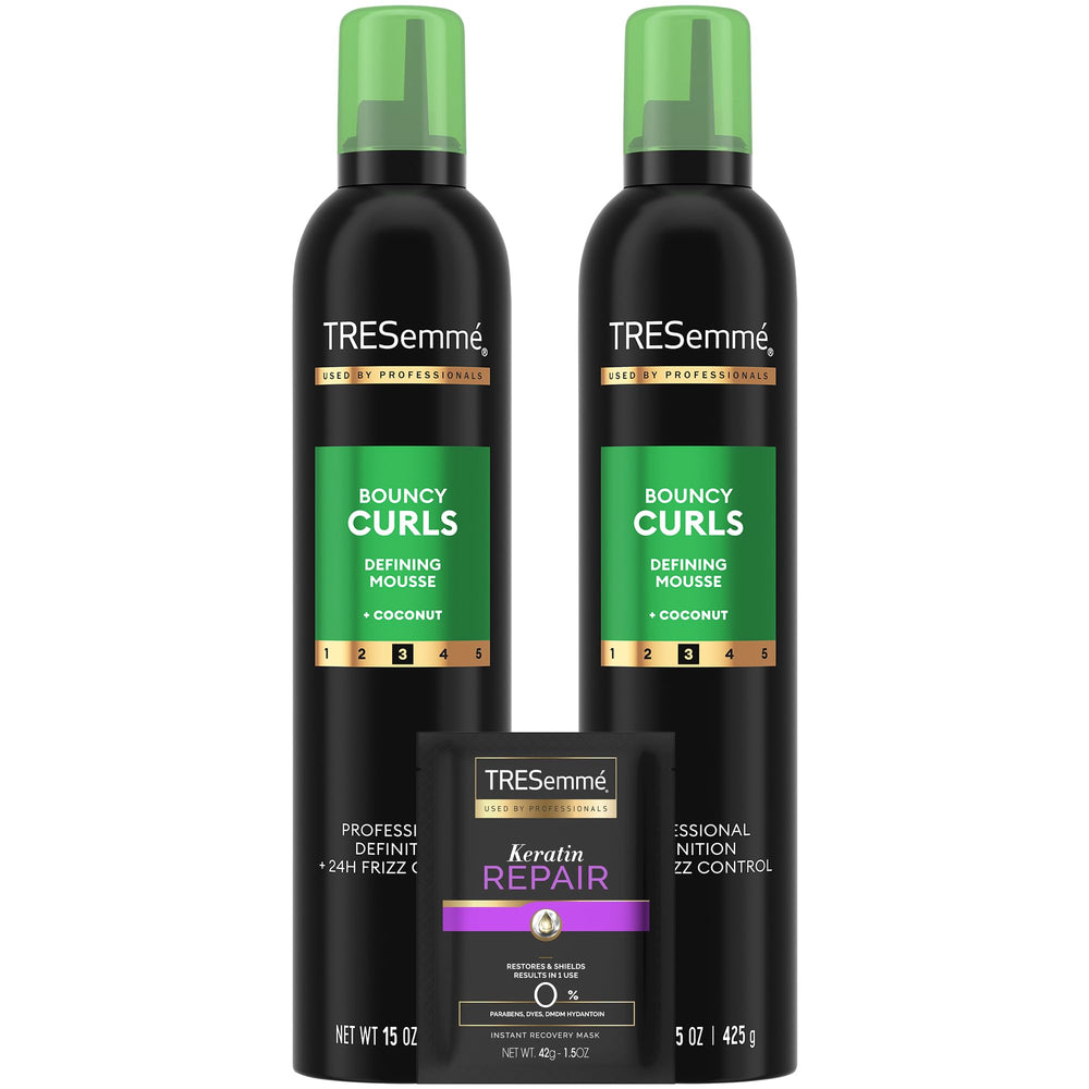 TRESemmé Defining Hair Mousse bottle delivers lasting bouncy curls and defined texture.