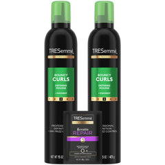 TRESemmé Defining Hair Mousse bottle delivers lasting bouncy curls and defined texture.