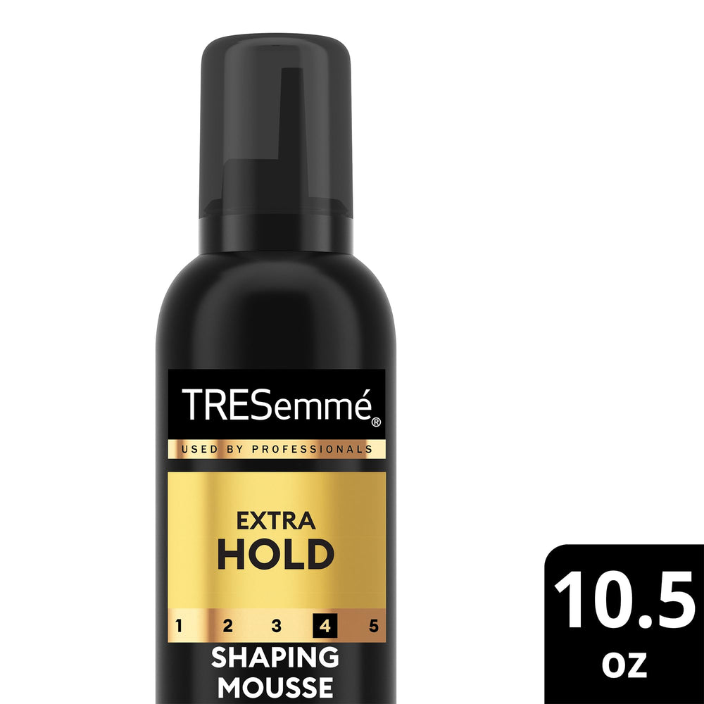 TRESemmé model with sculpted hair finish demonstrates polished style and frizz-free shine.