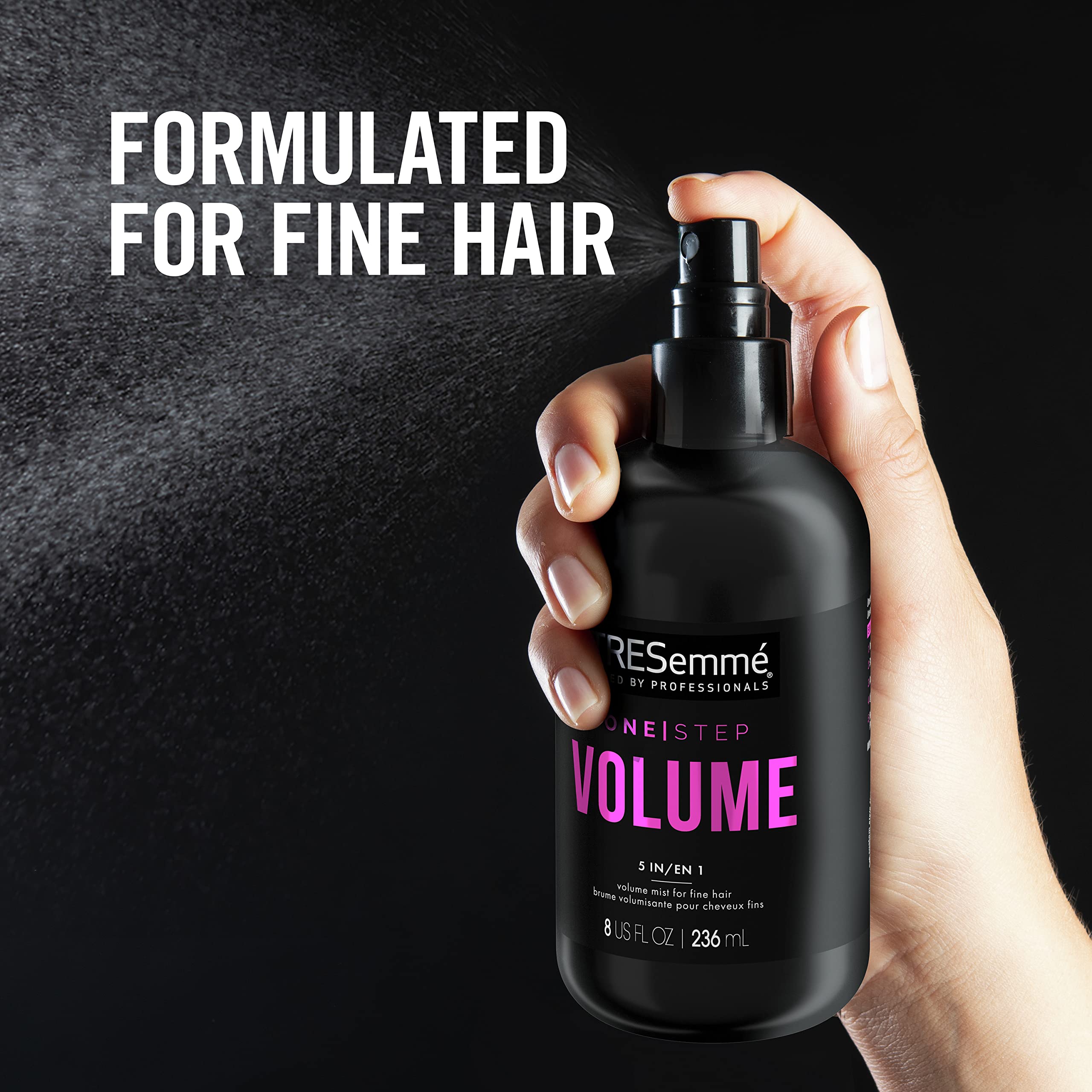TRESemmé One Step Volume Mist root lift shown during blow-dry with round brush.