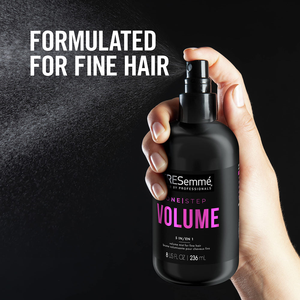 TRESemmé One Step Volume Mist root lift shown during blow-dry with round brush.