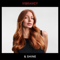 TRESemmé Revitalized Color Conditioner in shower for detangling.