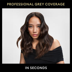TRESemmé spray in action on hair delivering even coverage.