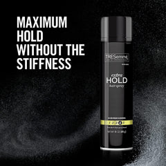 TRESemmé spray with soft touch finish demonstrates brush-out-friendly hold.