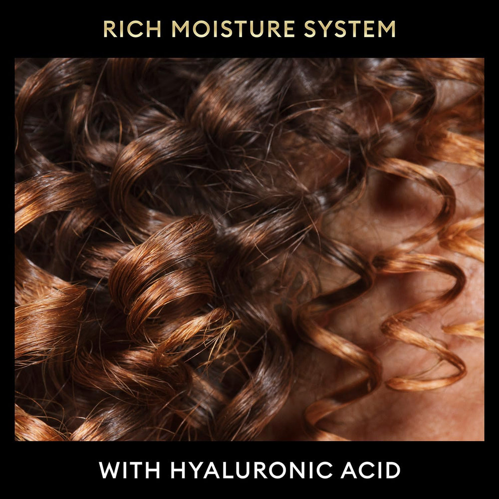 TRESemmé Rich Moisture formula highlighting vitamins and amino acids for hair nourishment.