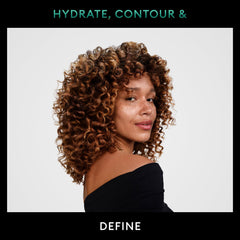 TRESemmé Bouncy Curls conditioner pump bottle for smooth detangling and frizz control.