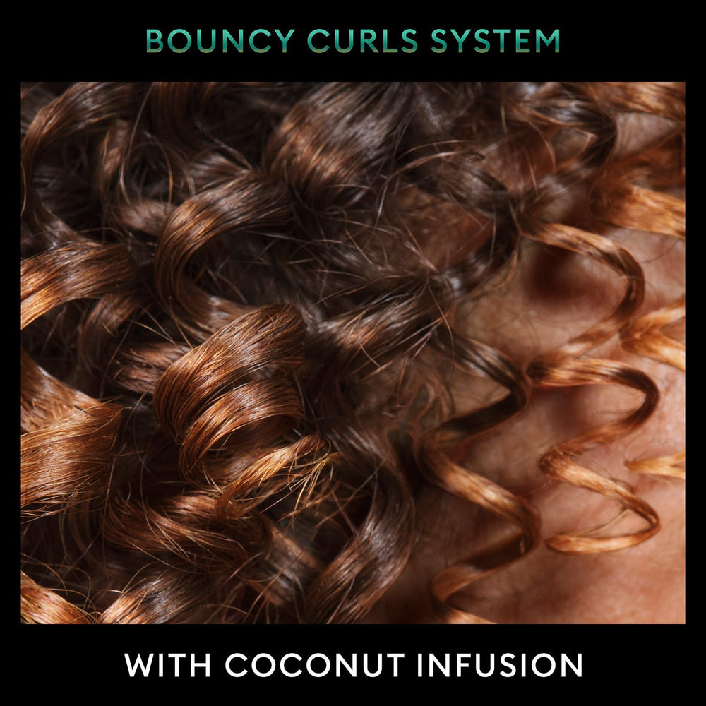 TRESemmé Bouncy Curls frizz-control formula enriched with coconut, avocado, and argan oils.