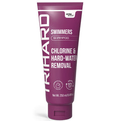 TRIHARD Swim Shampoo bottle by the pool for post-swim hydration.
