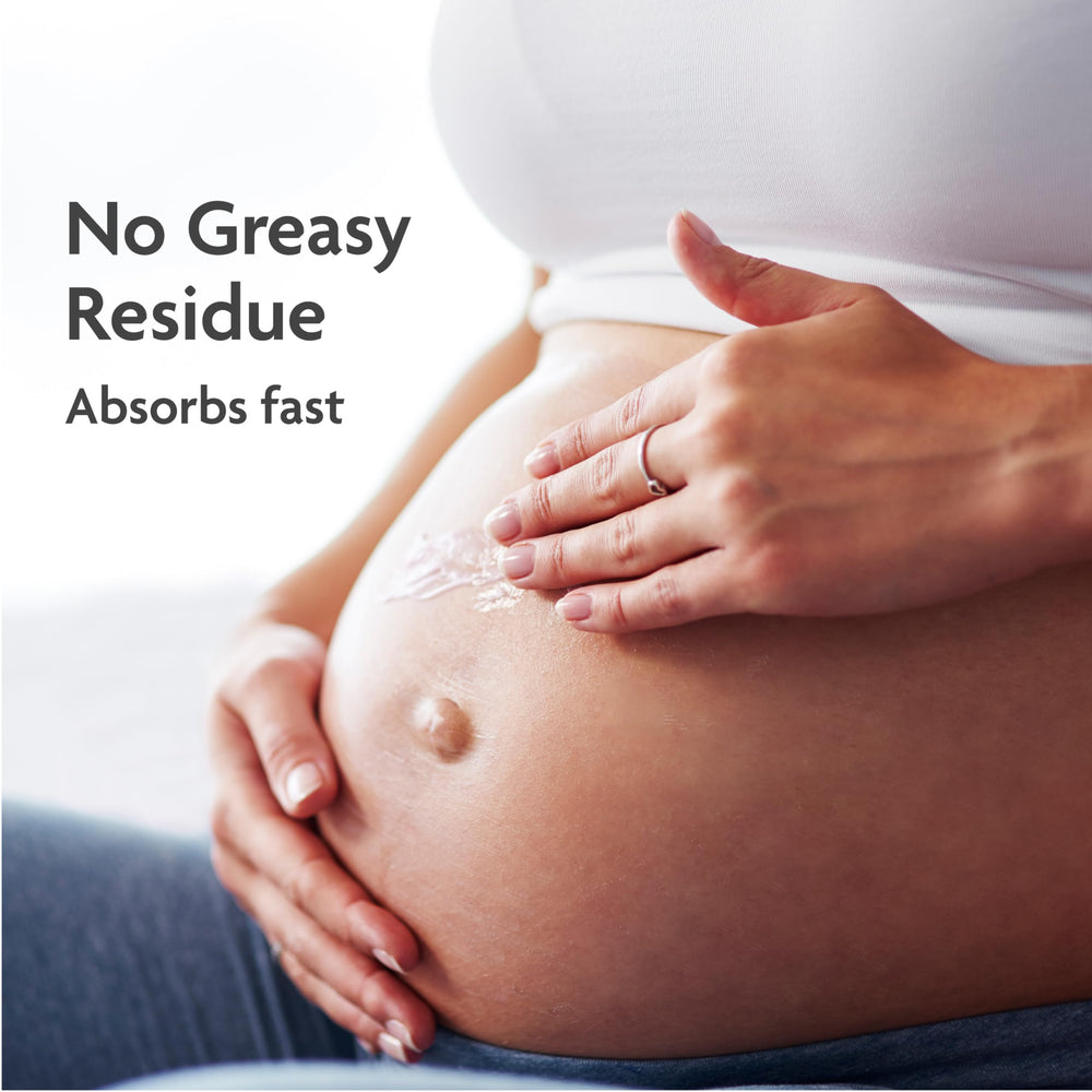 TriLASTIN stretch-mark cream texture non-greasy hand swirl shows quick absorption.