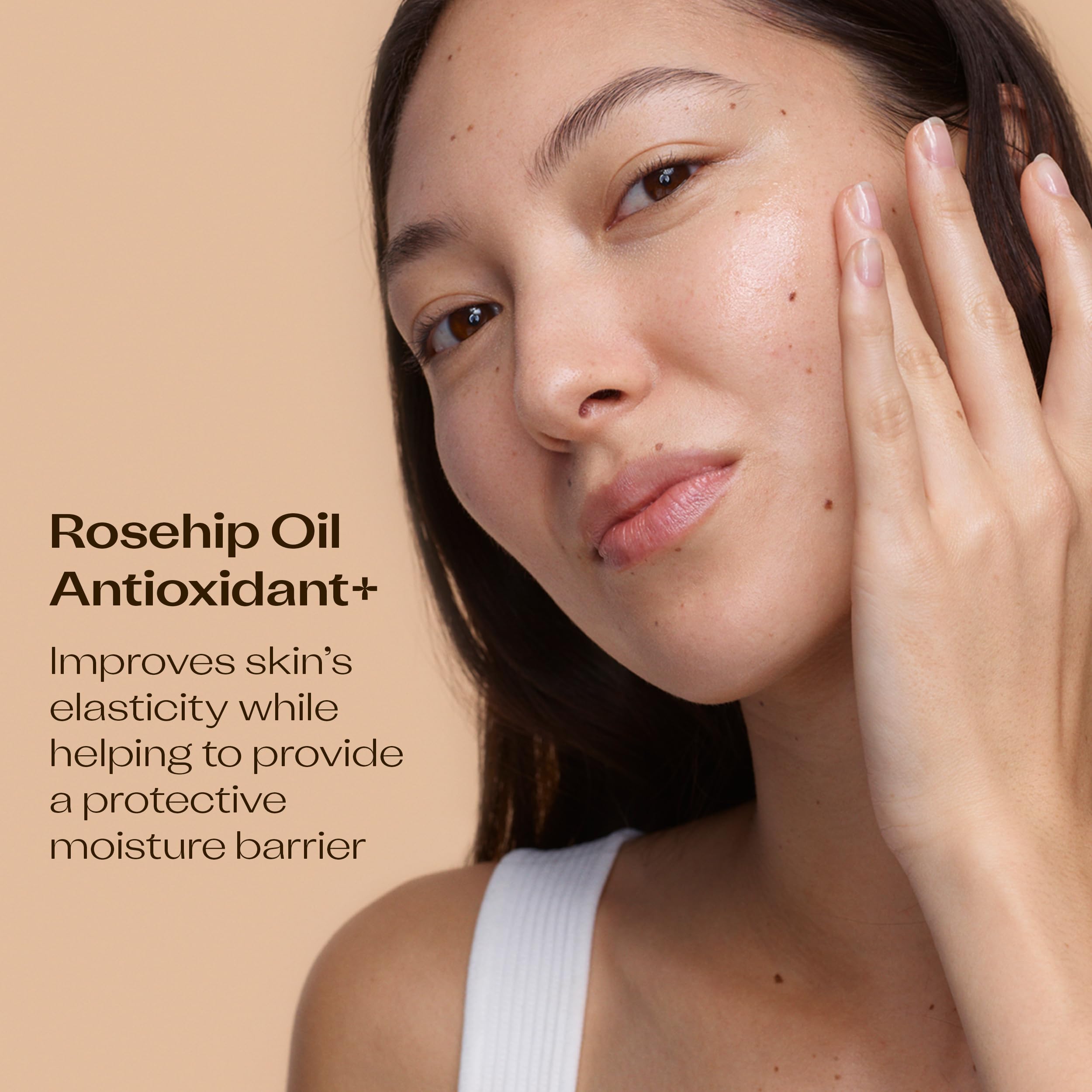 Trilogy Rosehip Oil Antioxidant+ drops close-up highlighting nourishing texture and glow.