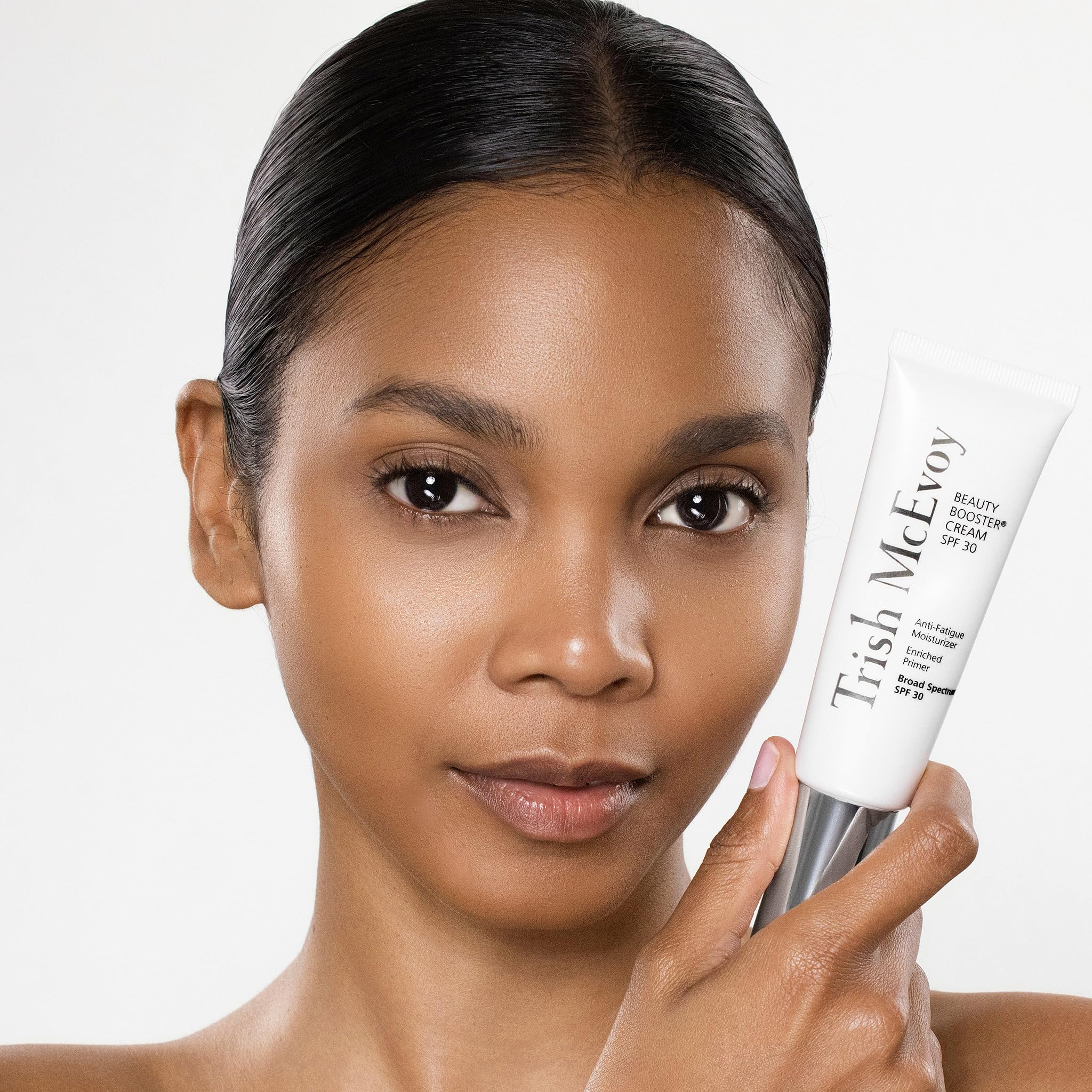 Texture close-up of Trish McEvoy Protective Shield Cream shows creamy primer feel on skin.