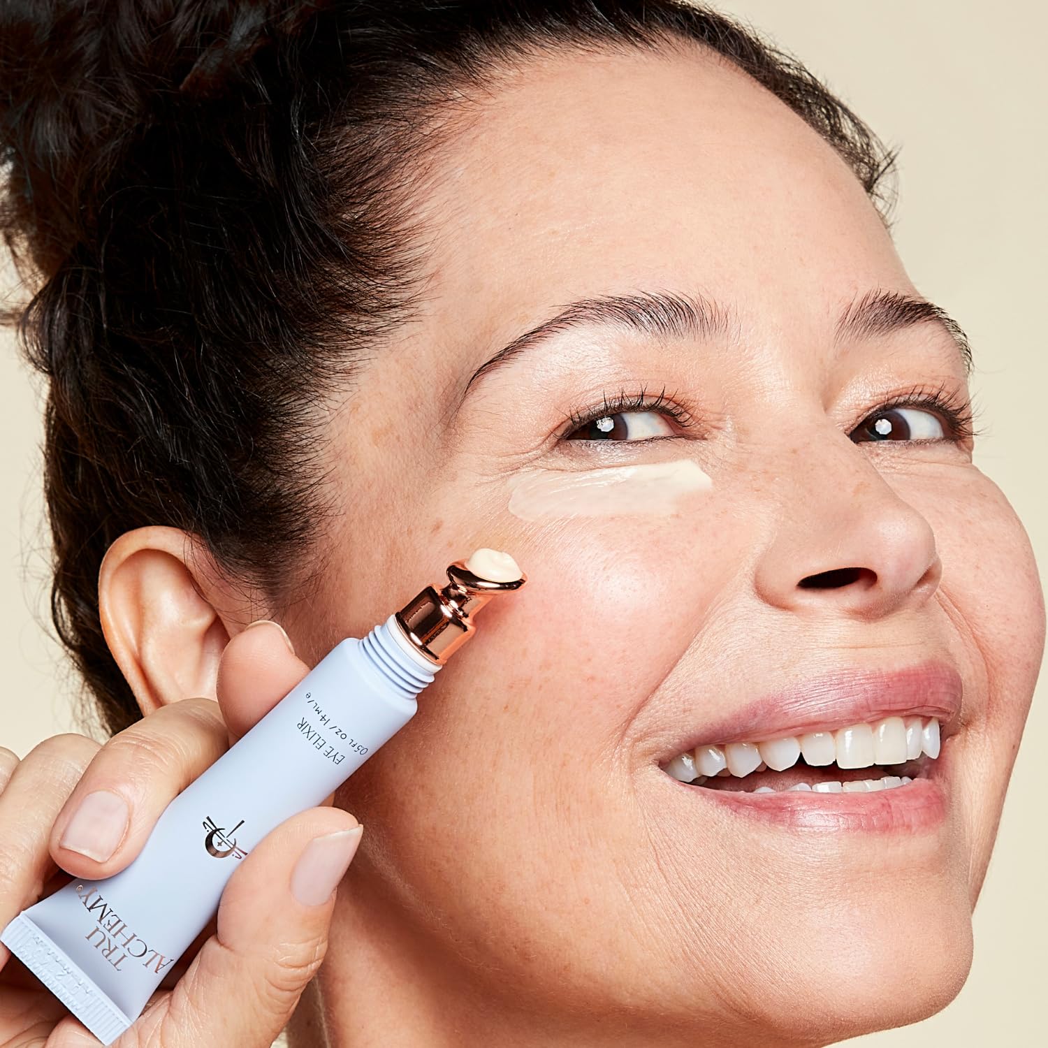 Tru Alchemy Eye Elixir Hyaluronix plump emphasizes delicate eye-area fullness.