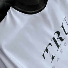 TRU BARBER lightweight breathable polyester fabric enhances comfort during sessions.