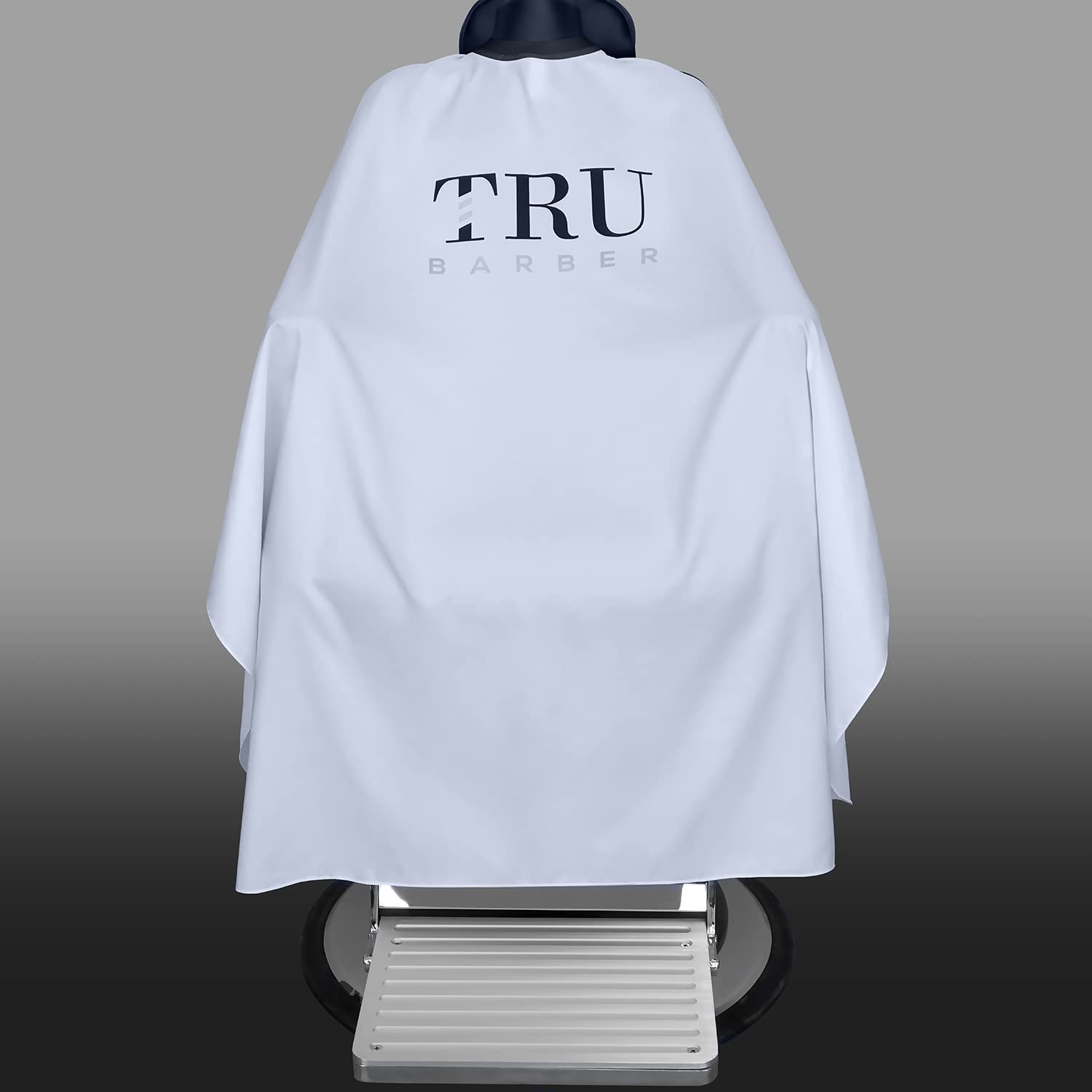 TRU BARBER snap closure shows secure plastic snaps for easy fastening.