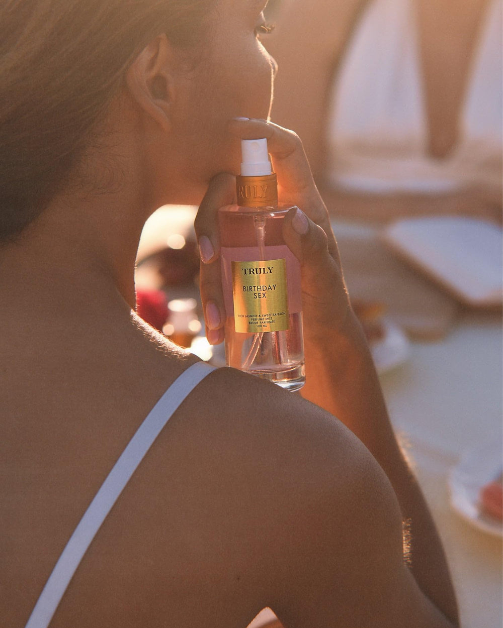 Truly Birthday Sex Perfume Mist skin-swipe demonstrates silk-on-skin finish.