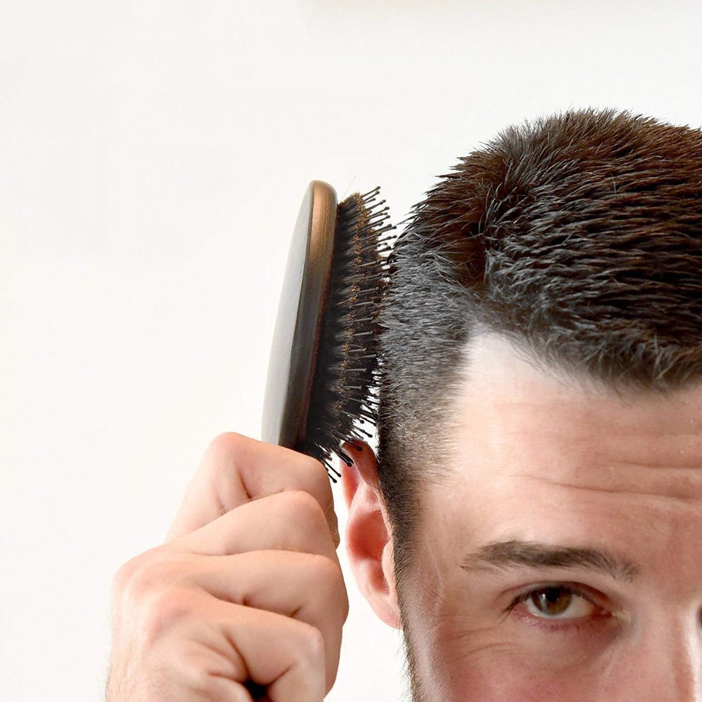 TRULY GENUINE STOCKHOLM brushing in action demonstrates detangling and even bristle glide.