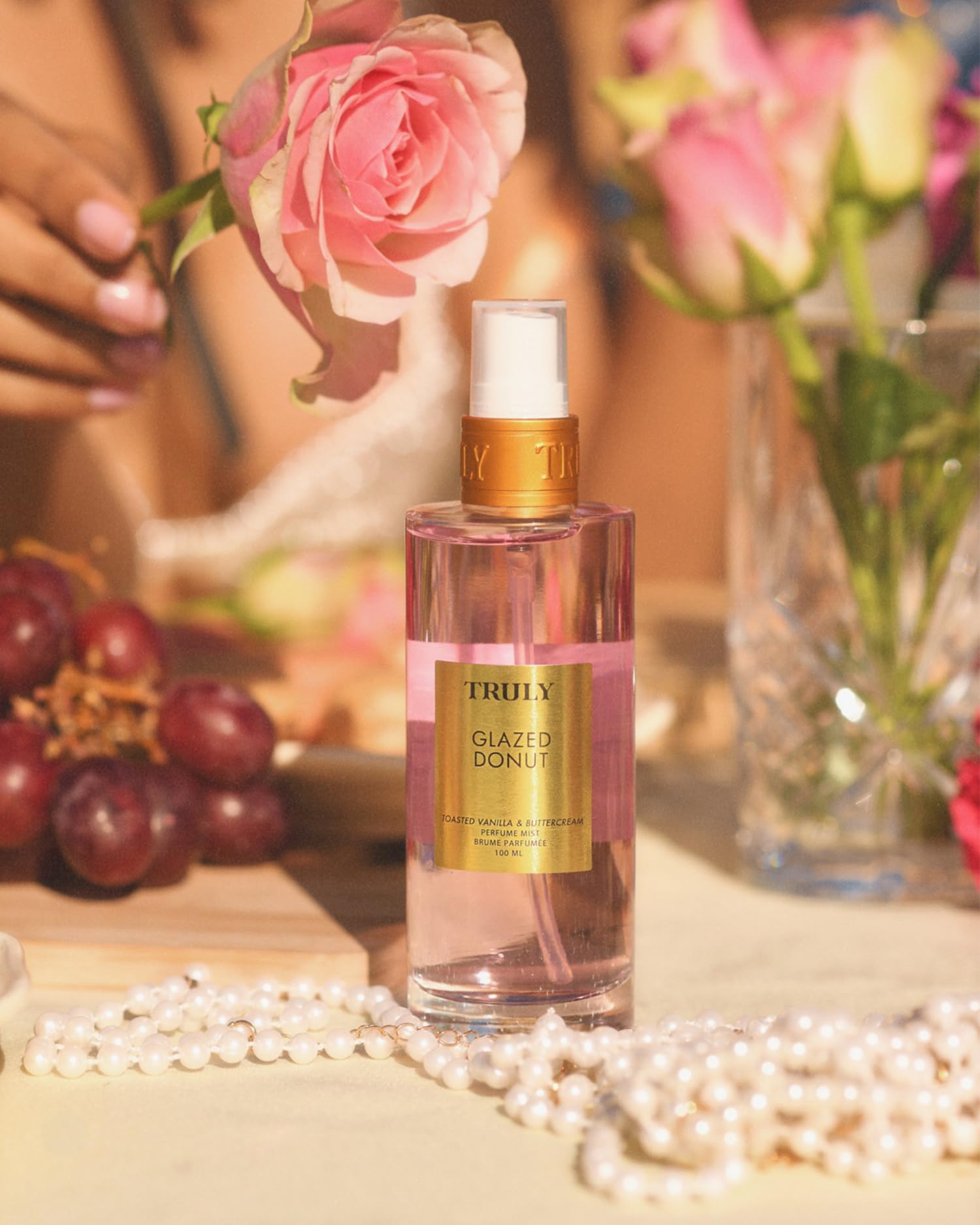 Truly Glazed Donut spray mist bottle highlights long lasting gourmand aroma for all day wear.