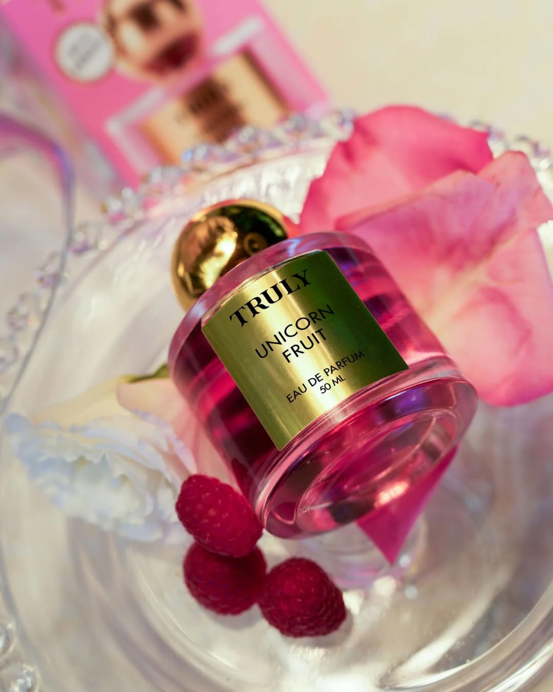 Truly Unicorn Fruit Parfum vanilla swirl close-up for warm, comforting scent.