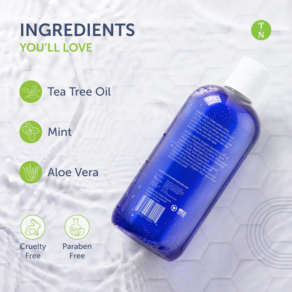 Peppermint leaves beside Truremedy Naturals body wash for energizing morning routine.