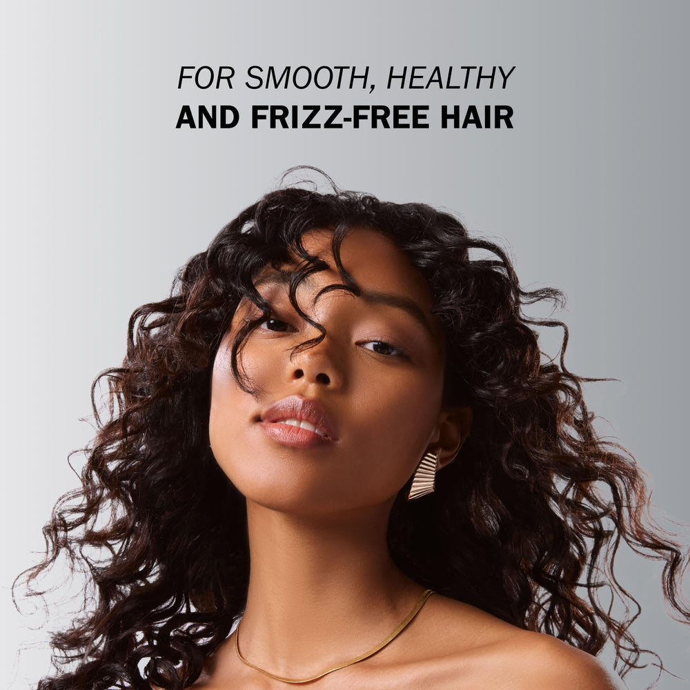 TRUSS Deluxe Prime Deep Conditioner texture closeup emphasizes creamy, rich hydration.