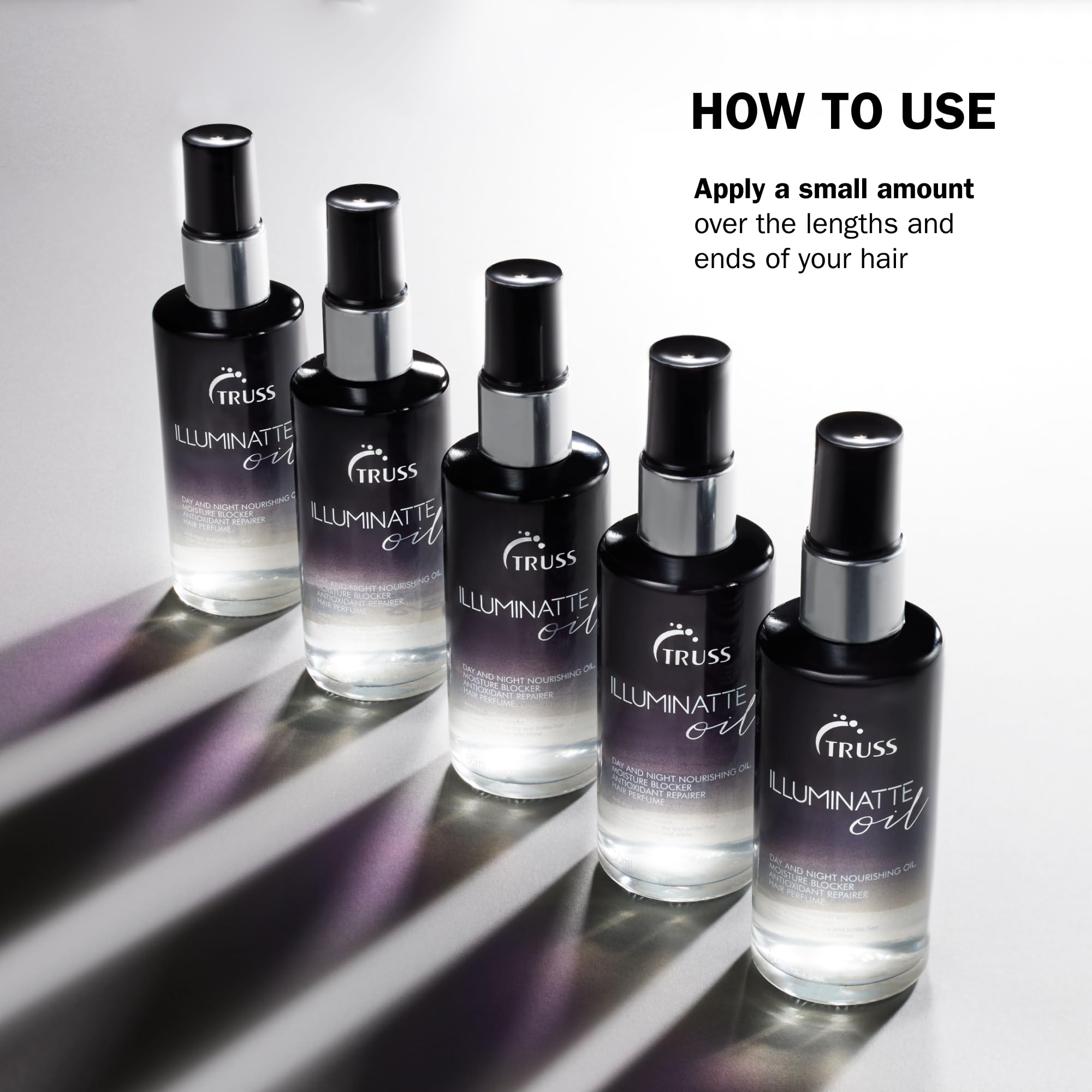 TRUSS Illuminatte Hair Oil applied to ends to seal split ends