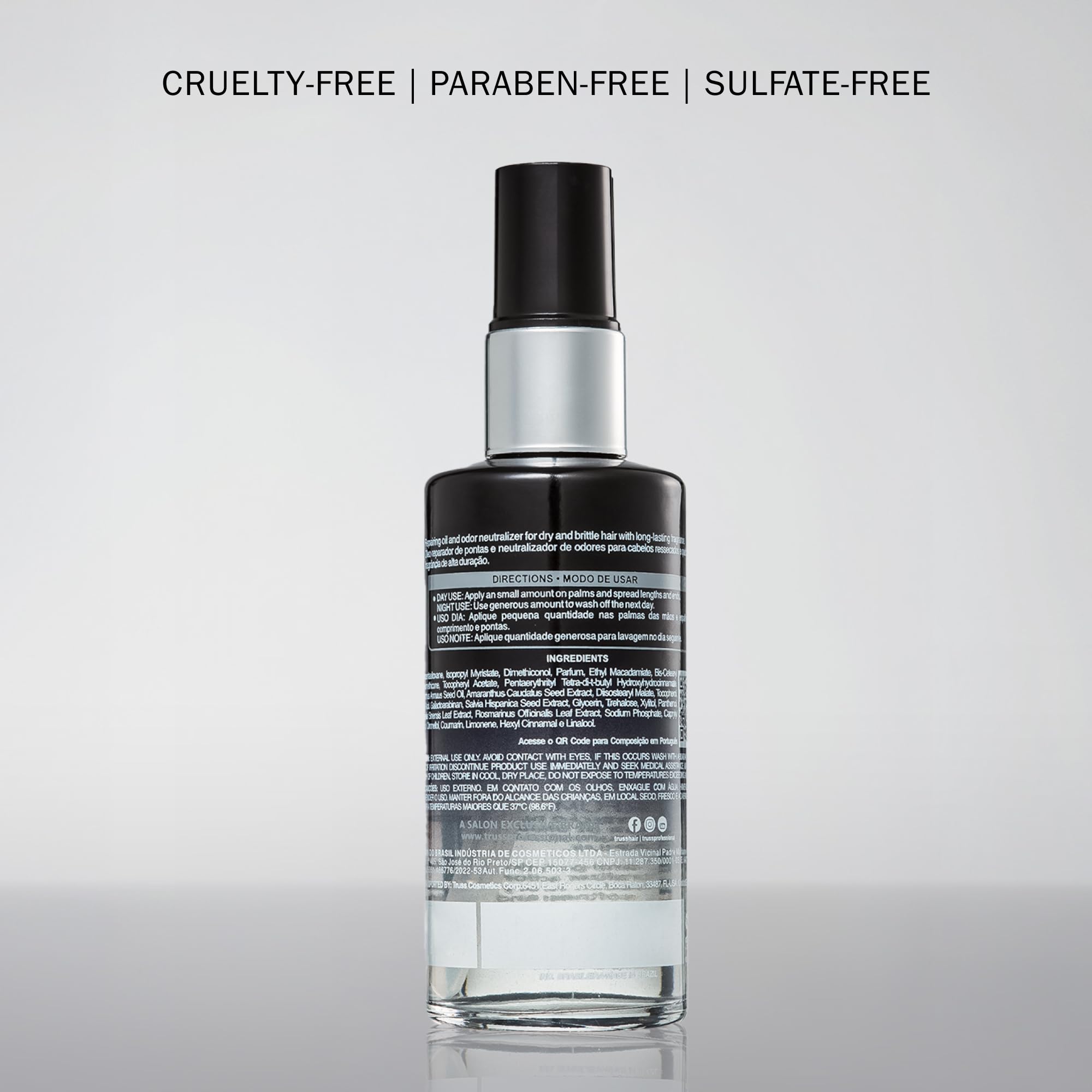 TRUSS Illuminatte Hair Oil sleek bottle on dry strands for shine
