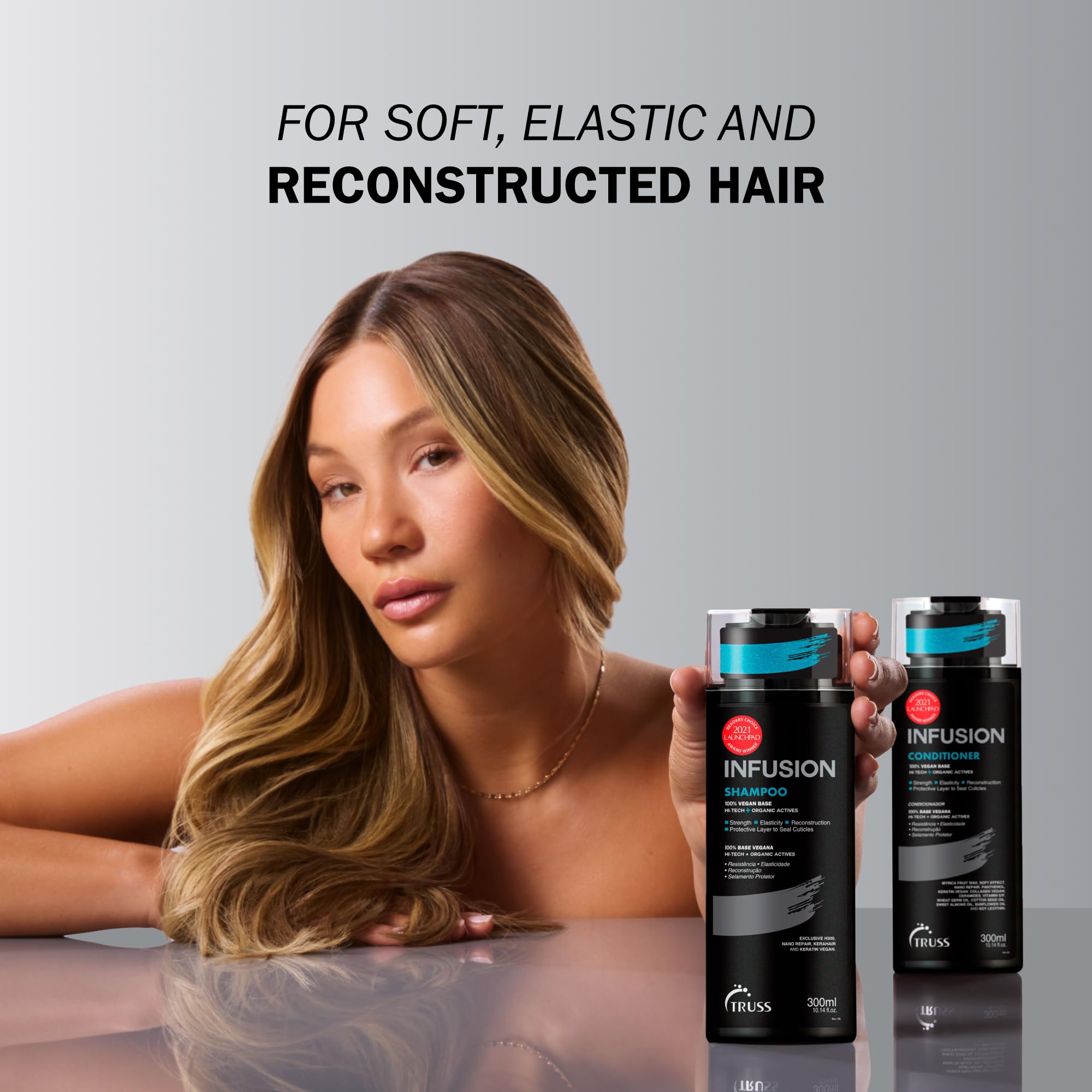 TRUSS Infusion conditioner being applied to damp hair for smoothing and manageability.