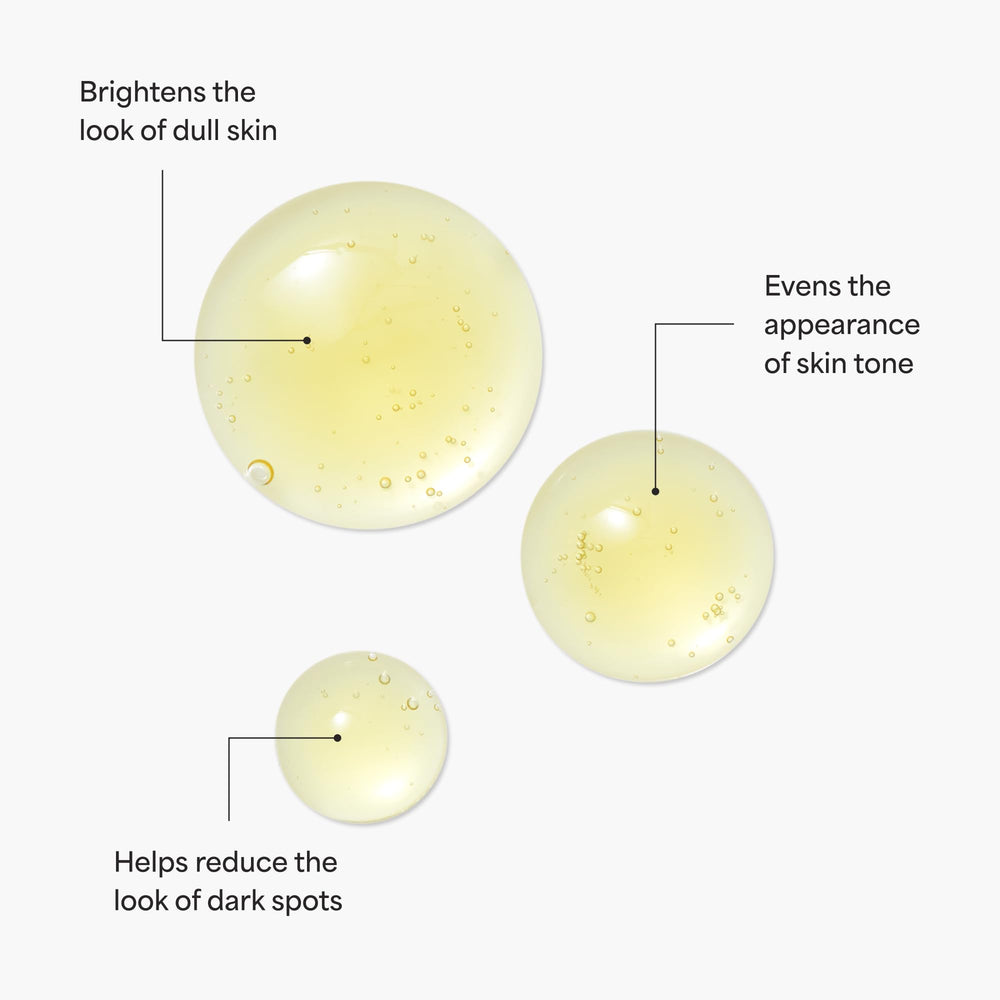 TULA Brightening Drops applied to skin for smoother texture and even tone.