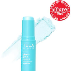TULA Glow & Get It Eye Balm tube dispensing for instant under-eye hydration.