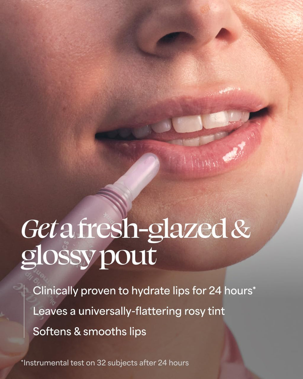 TULA Rose Glow Get It Lip Balm being applied for smooth lip texture.