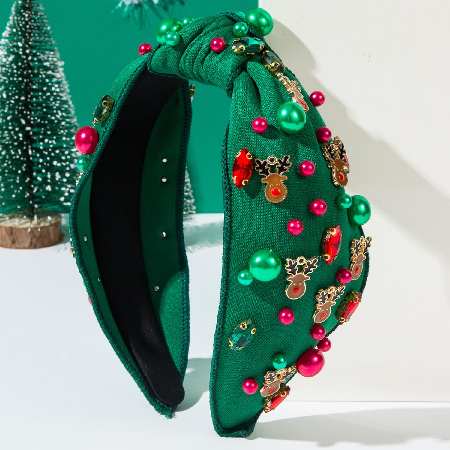 TULOBI headband with knotted design and pearl detailing for elegant holiday looks