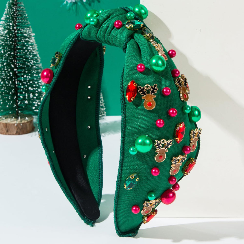TULOBI headband with knotted design and pearl detailing for elegant holiday looks
