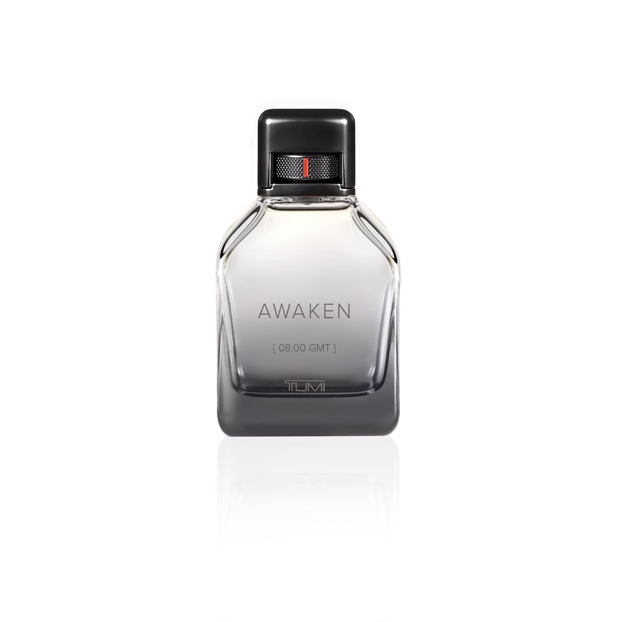 TUMI Awaken for Men applying to pulse points for long-lasting scent