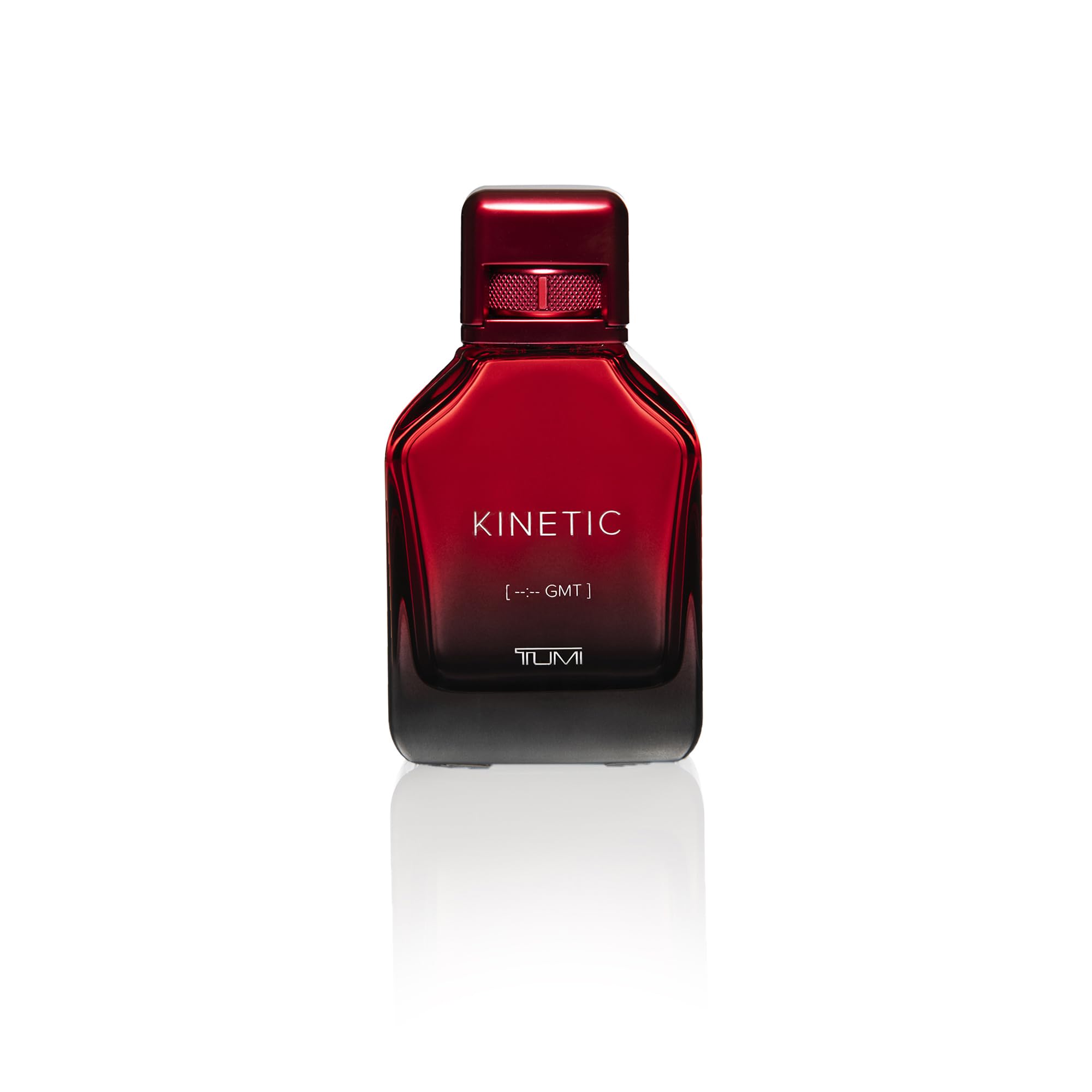 TUMI Kinetic for Men spray action captured mid-application for fresh, confident onset.