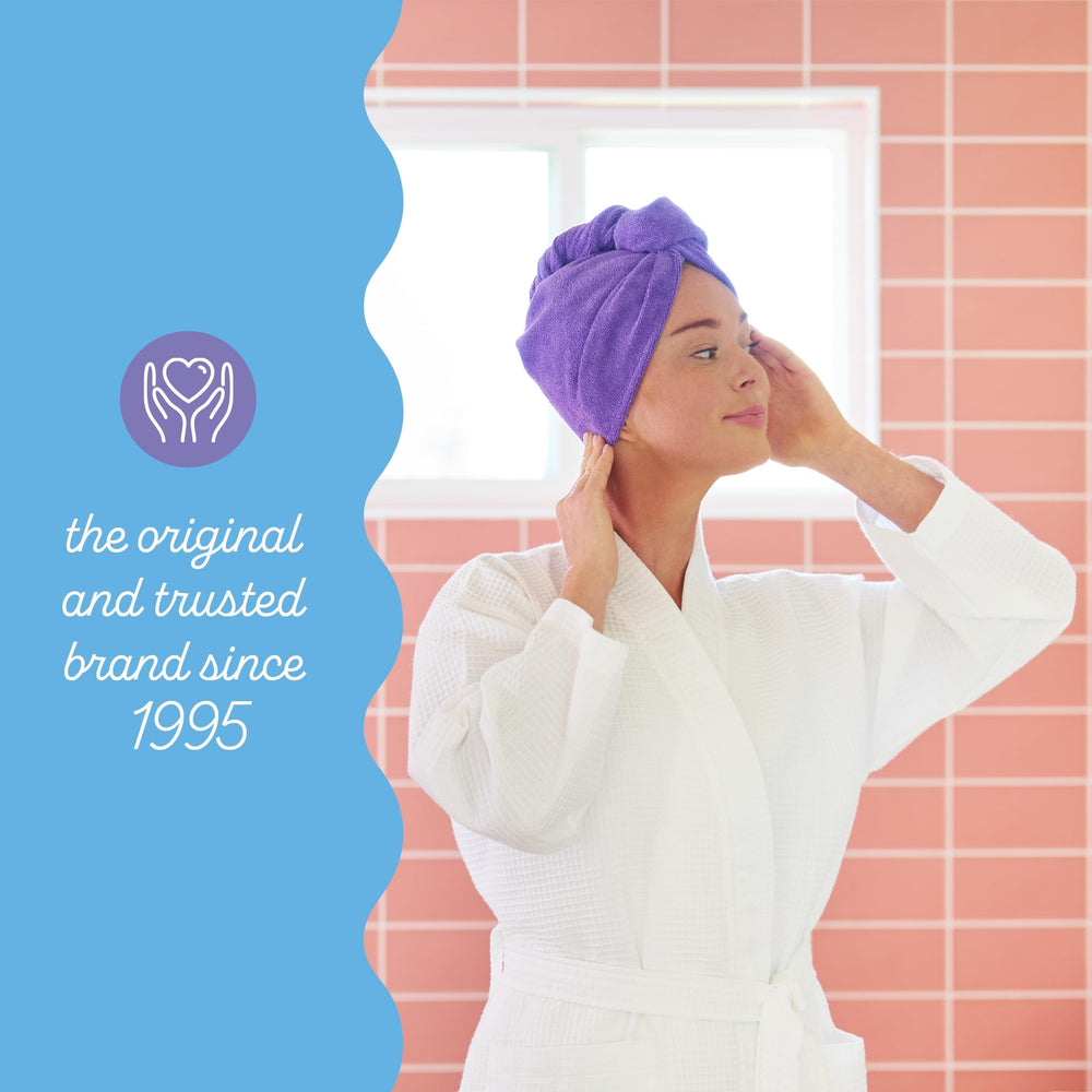 Turbie Twist twist-and-loop system securing lightweight head wrap in use.