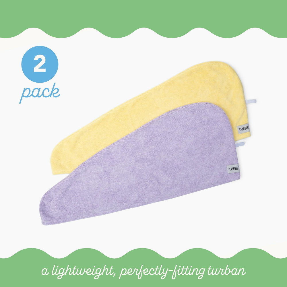 Turbie Twist lilac hair wrap worn for fast frizz reducing drying