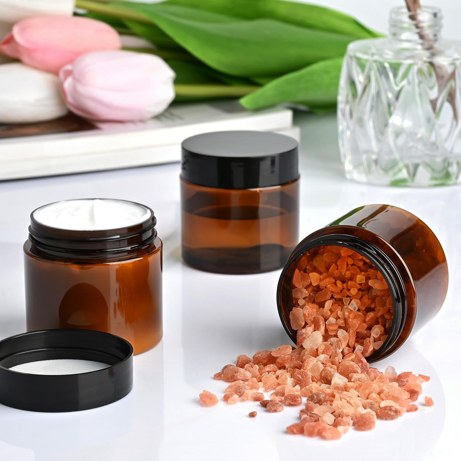 TUZAZO travel-friendly amber 2 oz kit supports on-the-go storage.