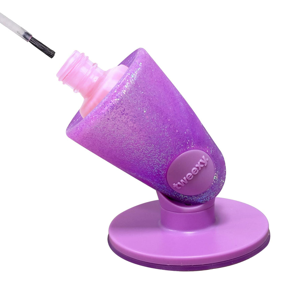 Tweexy Hinge untippable bottle holder tilted angle for steady polish application.